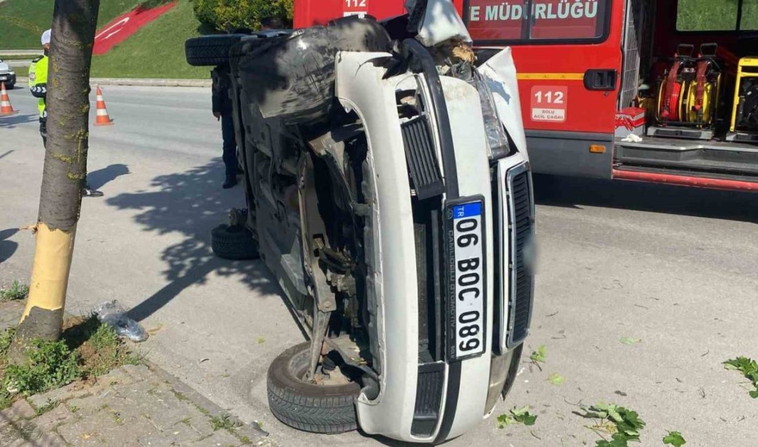Bolu’da rampa yukarı çıkarken kontrolden çıkarak yan yatan otomobilin, güvenlik