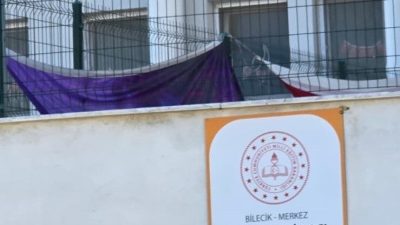 Bilecik’te özel bir okulun bahçesine asılan Türk bayrağının yerde sürünmesi